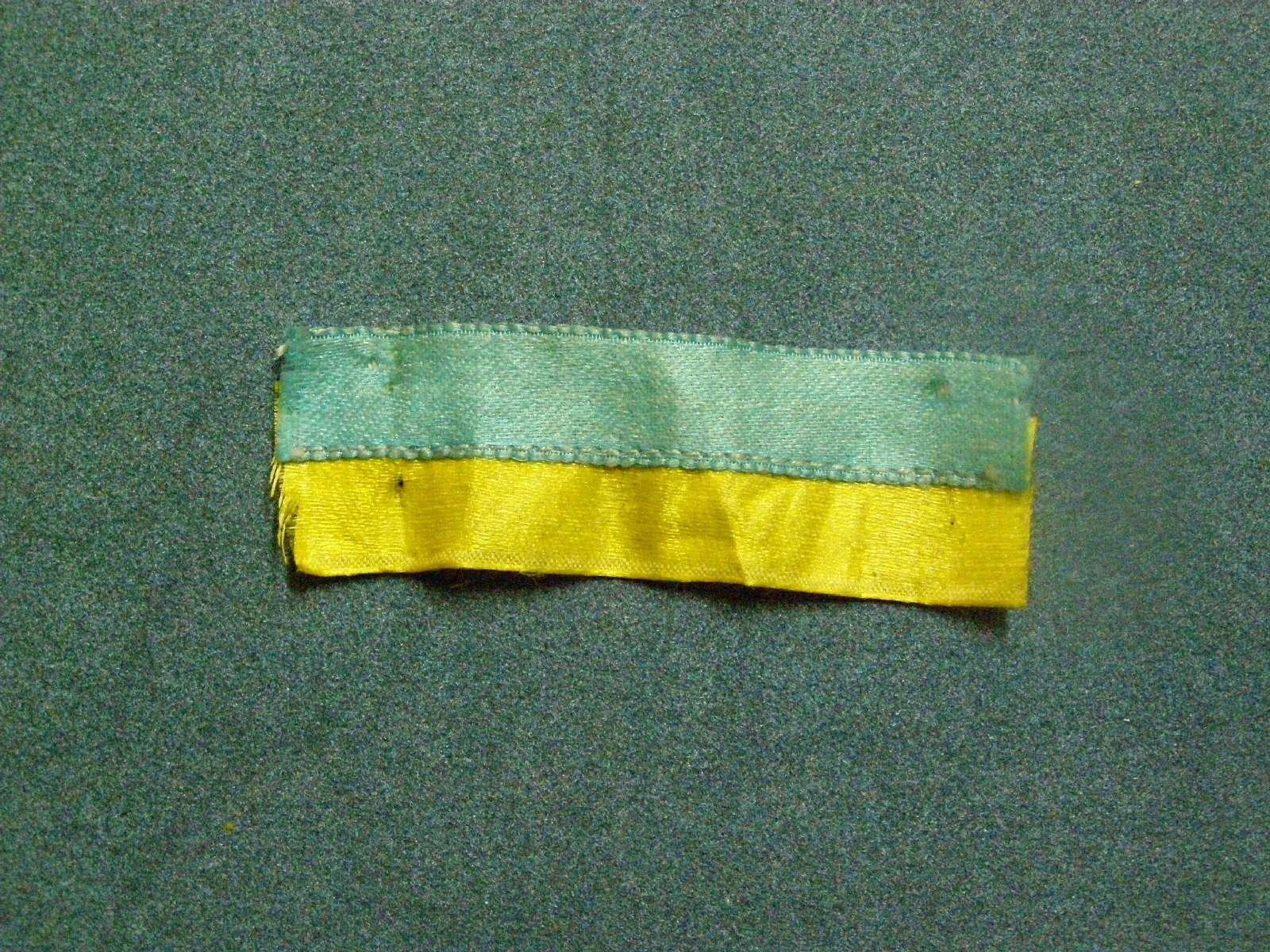 Жовто-блакитна стрічка. Фрагмент 6 см, тканина. Без дати.